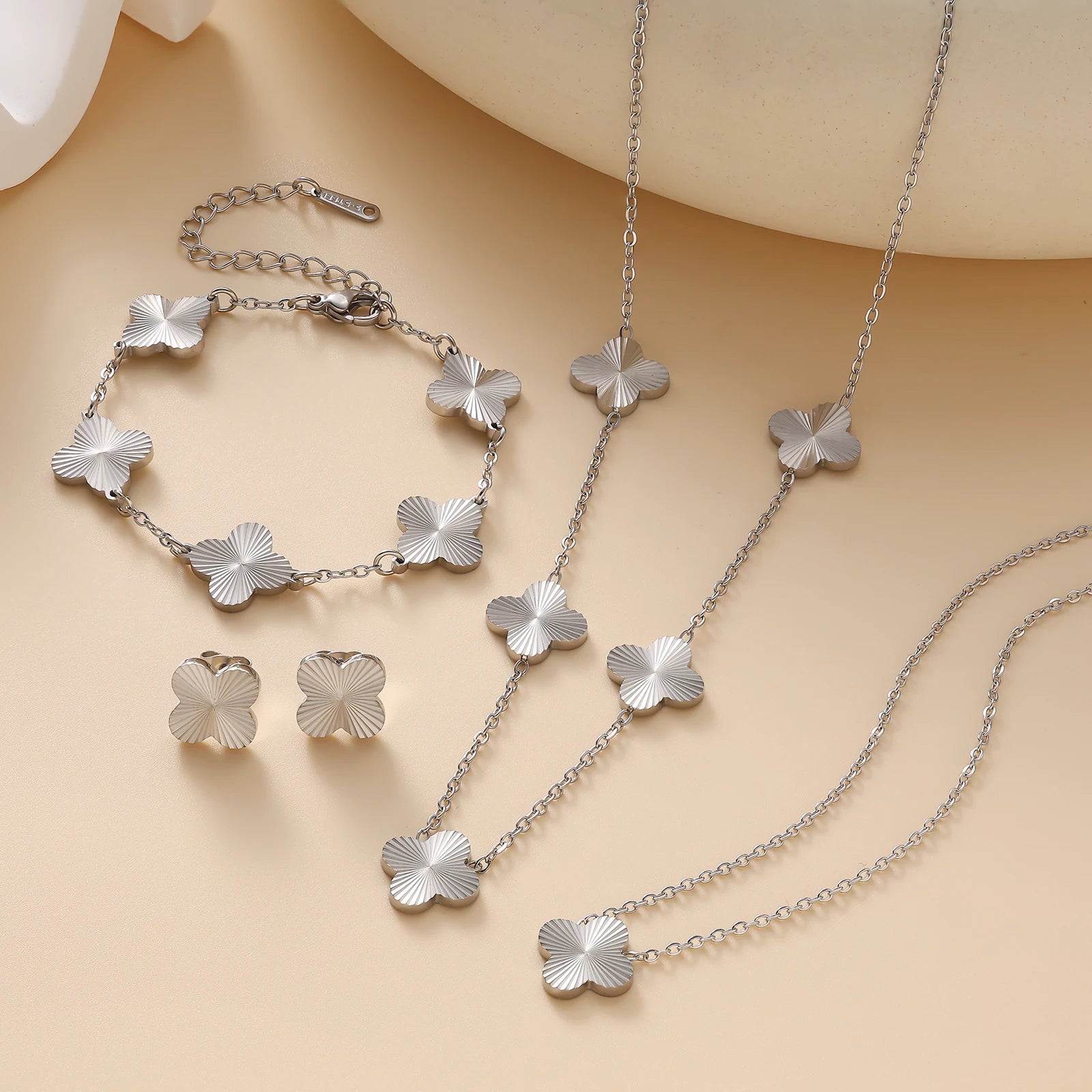 Fashionable stainless steel hand polished clover flower bracelet necklace earring set